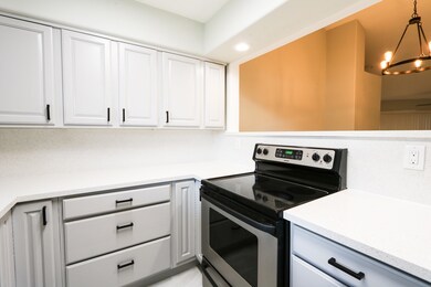 New kitchen with: Quartz countertop, new refrigera