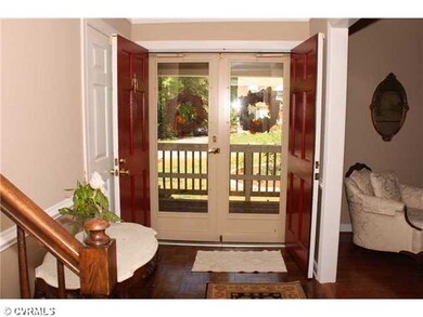 Foyer - Welcoming foyer with hardwood floors & dou