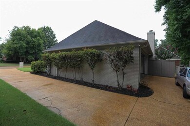 View of long side driveway to rear load garage. Pl