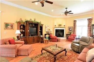 THIS GREAT ROOM IS SO LARGE IT HAS TWO CEILING FAN
