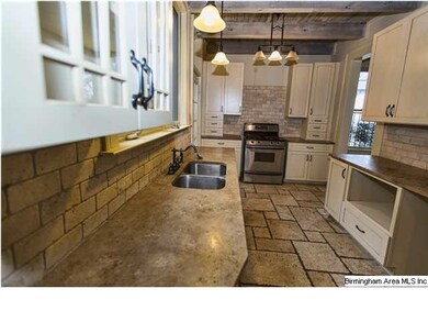 Updated kitchen with stainless, gas stove, charmin