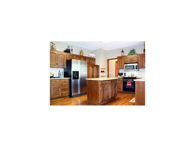Updated kitchen with island and a lot of cabinet s