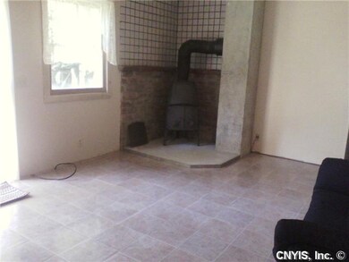 Living Room. Wood burning stove comfortably heats 