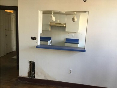 Opening from dining room to kitchen Unit 202-A.  A