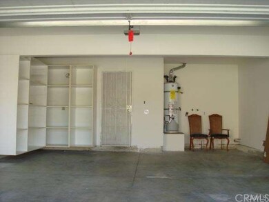 Photo is from 2012, Garage, storage, laundry area.