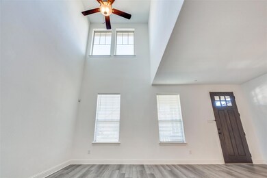 Vaulted ceilings in the living room with lots of n