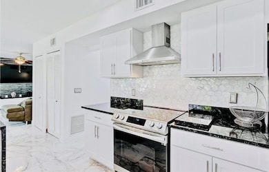 128 Royal Pine Cir N, Royal Palm Beach, FL 33411 - photo 5