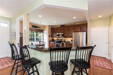 center island overlooking dining area and living r