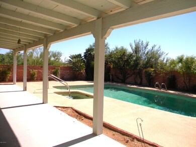 Back patio overlooking walledin pool/spa