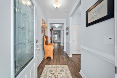 Interior space featuring dark wood-type flooring, 