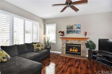 Inviting Family Room with Fireplace, Plantation Sh