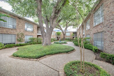 Gorgeous common area with mature trees.