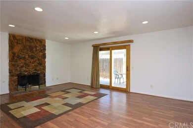 Amazing fireplace in the family room with new lami