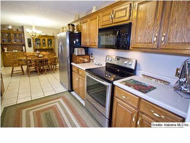 Kitchen has new stainless steal oven.
