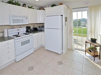 This View of the Kitchen Shows the Sliding Glass D
