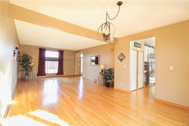 Front to back living room/dining room with gleamin