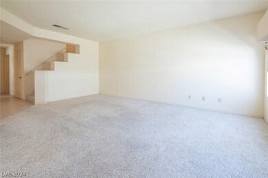Living Room with fireplace, open floor plan and lo