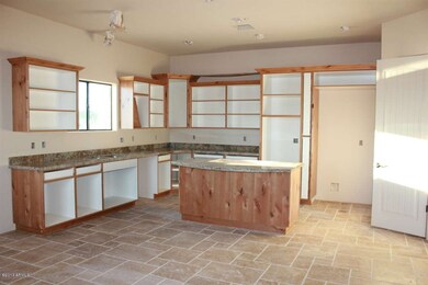 Kitchen w/ granite and alder cabinets