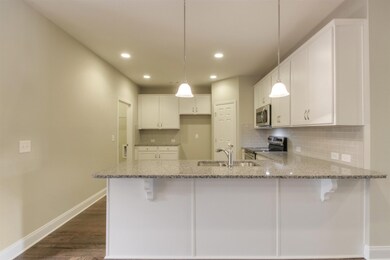 Another view of the kitchen. *Home under construction. Photos of another Waverleigh with similar finishes for representation only.