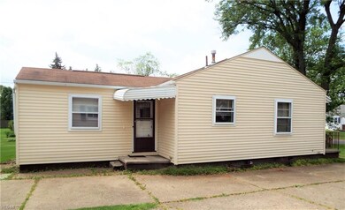 SIDE ENTRANCE AND CEMENT DRIVEWAY