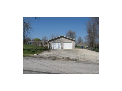 36x28 Building with 2 8x10 garage doors, driveway 