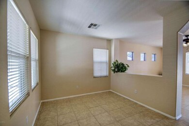 Living room arch way to family room