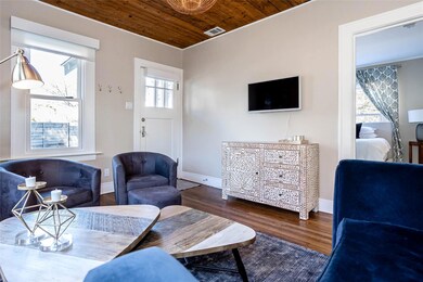 Living room with plenty of natural light, wooden 