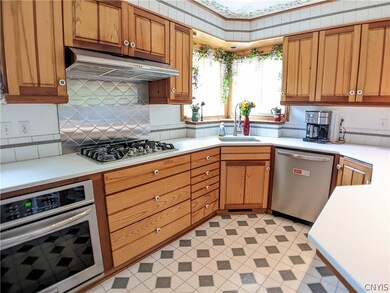 Custom built cherry and ash wood cabinetry