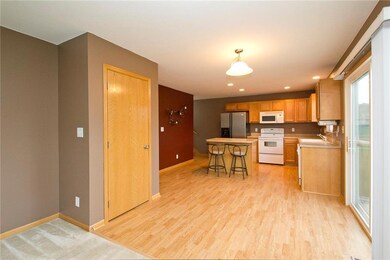 Kitchen is open to the living room with the cozy f