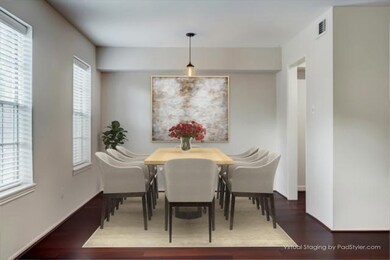 This is a virtually staged dining room. Notice the