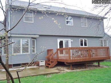 Deck and cement patio-overlooks a spacious rear ya