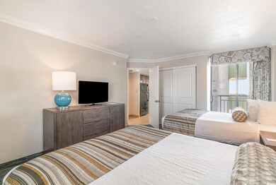 Private Bedroom featuring 2 queen beds