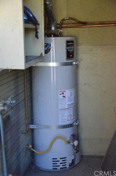 Newer Water Tank in Utility Room