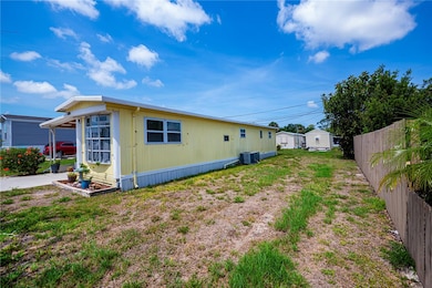 Side of home.  Skirting around bottom.