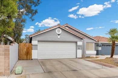 Ranch-style home with stucco siding, concrete driv