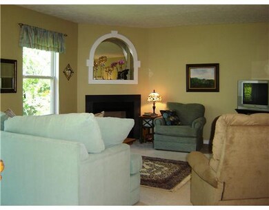 Living Room. A gas fireplace adds ambiance to the 