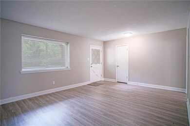 Additional view of living room with large picture