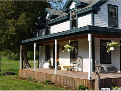 Exterior Front. Curb appeal and a tire swing.