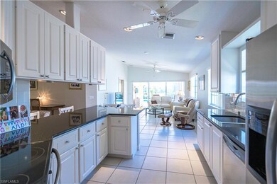 Large Open Kitchen has views of Pool and Lake