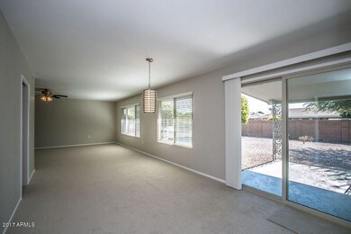 View to covered patio and back yard