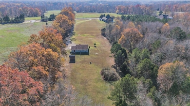 ABSOLUTELY Gorgeous + Peaceful Country Setting!!! 5.01 Acres+/- Aerial Drone View of the Area-Rely on Survey for exact property lines