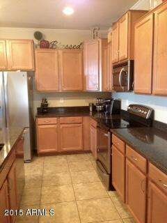 Staggered Cabinets & Granite Countertops