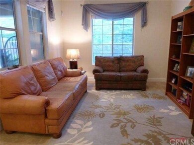 Open floorplan living area. Living room features 3