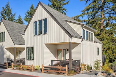 Welcome to Thornton Creek Commons, designed with community in mind. 2216 NE 125th enjoys a sunny west facing covered front porch at the welcoming front door entry.