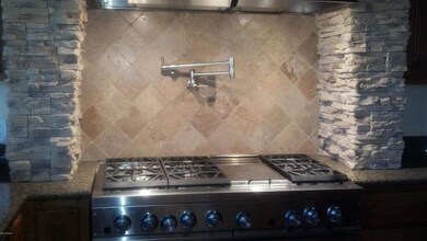 kitchen close up of stove top and w