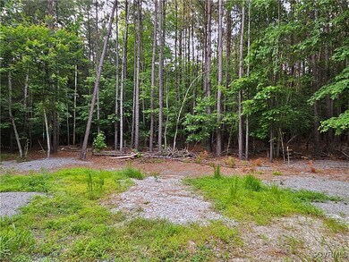 View of yard featuring a forest view