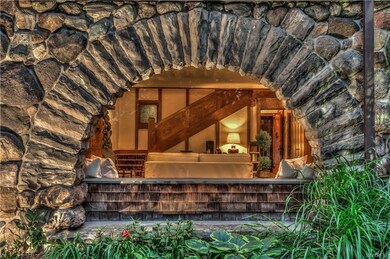 A view into the living room through the Romanesque