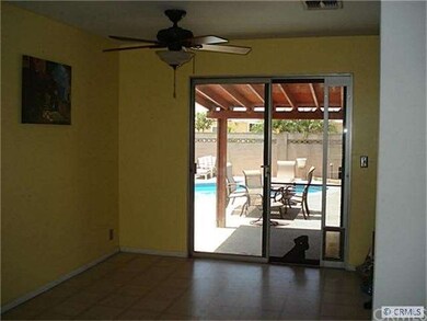 Dining area with sliding glass to backyard.