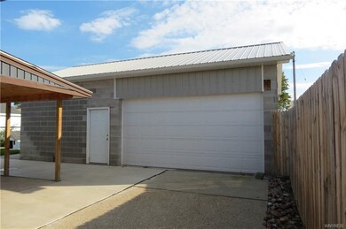 Garage is approximately 32x22 with approx. ceiling