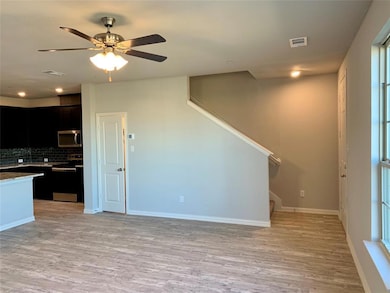 ADDITIONAL STORAGE CLOSET GOES DEEP UNDER STAIRWEL